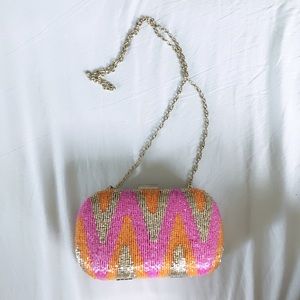 Aztec print box clutch with drop chain